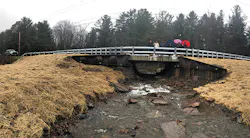 The project team looking over the new culvert
