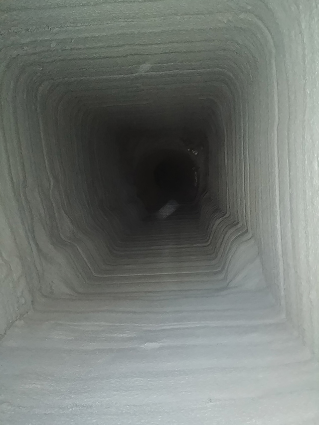 Rehabilitated 5.5-by-5-foot achred limestone block and mortar culvert