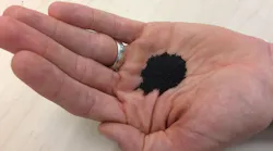 Mineral-coated sand could unlock new water supply by removing two kinds of contamination.