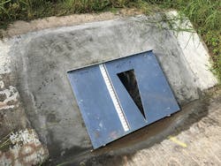 Figure 1: A triangular weir was used on the CMP headwall to allow for accurate flow measurements. Figure 1: A triangular weir was used on the CMP headwall to allow for accurate flow measurements.