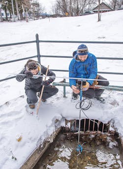 Corey Laxson and Elizabeth Yerger from the Paul Smith’s College Adirondack Watershed Institute measuring discharge at the outlet of Mirror Lake. Corey Laxson and Elizabeth Yerger from the Paul Smith’s College Adirondack Watershed Institute measuring discharge at the outlet of Mirror Lake.