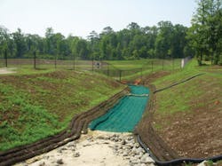 A stream bank restoration at Camp Lejeune leading to a retention pond. The project used erosion control socks with McGill SoilBuilder Premium Compost. A stream bank restoration at Camp Lejeune leading to a retention pond. The project used erosion control socks with McGill SoilBuilder Premium Compost.