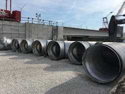 ALT2 corrugated metal pipe infiltration system being installed next to the reconstructed I4.