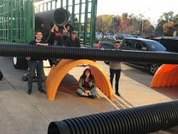 Virginia Tech students pose with Advanced Drainage Systems' stormwater management products during an on-site exhibition at the school. Virginia Tech students pose with Advanced Drainage Systems' stormwater management products during an on-site exhibition at the school.