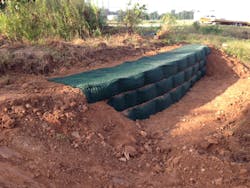 Figure 2. Example wrap-face construction showing three completed lifts. Figure 2. Example wrap-face construction showing three completed lifts.