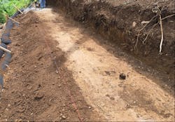 Figure 5. Compacted (proof-rolled) subgrade ready for first geosynthetic wrap lift