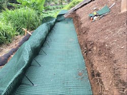 Figure 6. Placement of initial wrap-lift ready for soil backfill Figure 6. Placement of initial wrap-lift ready for soil backfill