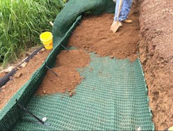 Figure 7 A. Placement of fill soil Figure 7 A. Placement of fill soil