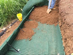 Figure 7 A. Placement of fill soil Figure 7 A. Placement of fill soil