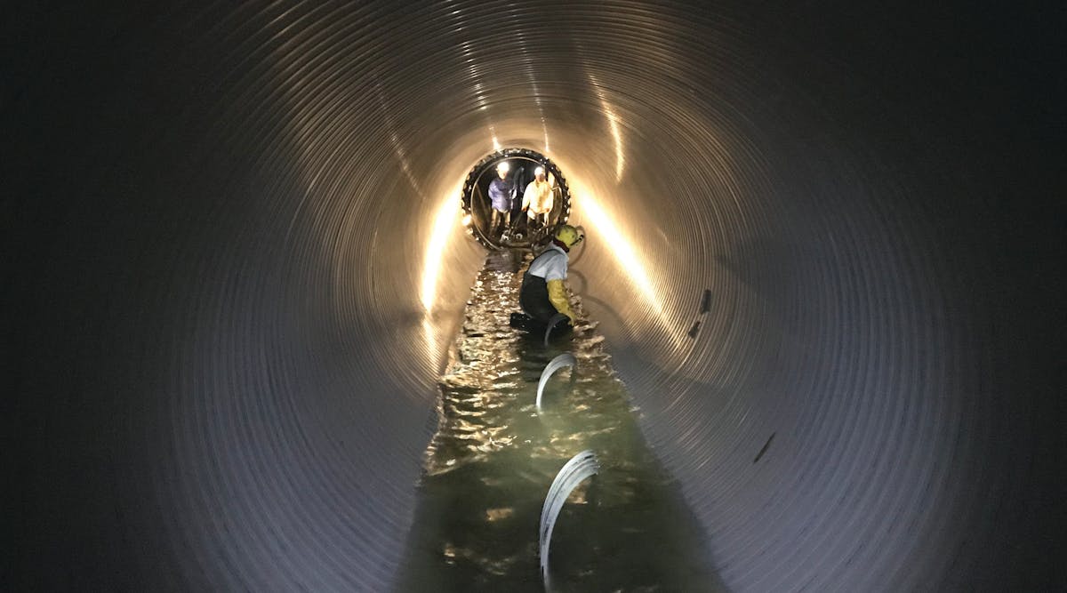 82-inch PVC liner installed in live flow