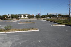 Once installed, the permeable paver grid is filled with gravel. Once installed, the permeable paver grid is filled with gravel.