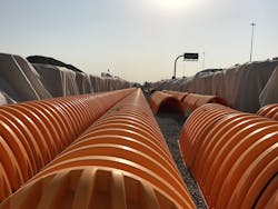 The system of arch-shaped chambers in multiple tanks was buried with up to 3.96 meters (13 feet) of cover. The system of arch-shaped chambers in multiple tanks was buried with up to 3.96 meters (13 feet) of cover.