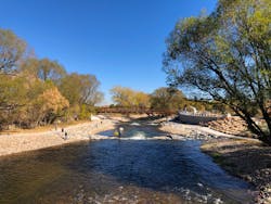 A long view of the completed bridge and park A long view of the completed bridge and park
