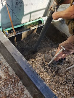 Installing the media layers in Jensen Precast’s StormVault prior to testing Installing the media layers in Jensen Precast’s StormVault prior to testing