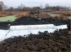 Early construction on the levee reconstruction at Kline Wetland.