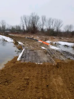A temporary bridge was erected over the failed zone of the levee.