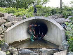 Dr. Marccus Hendricks during the installation of the flow equipment and sonde Dr. Marccus Hendricks during the installation of the flow equipment and sonde