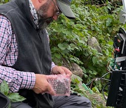 Lower 48’s Chirs Davis installing In-Situ Mace equipment at a major outfall on campus. Lower 48’s Chirs Davis installing In-Situ Mace equipment at a major outfall on campus.