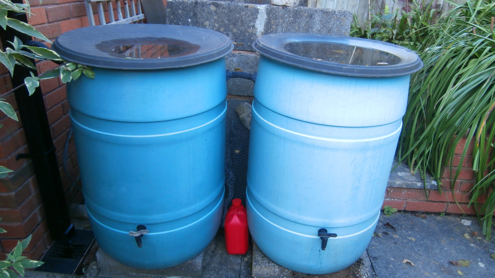 A pair of rain barrels. Practices like these would allow Bethlehem homeowners fee savings through stormwater credit programs.