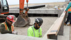 Seaside Heights Public Works team members demonstrate the removable coastal flood barrier at the Grant Avenue Vehicular Access in the community. USACE worked with Weeks Marine, Walters Marine, the product manufacturer AccessRec Inc, New Jersey Department of Environmental Protection, and the borough of Seaside Heights to construct the barrier, providing the municipality with the flexibility to manage beach access and storm situations appropriately.