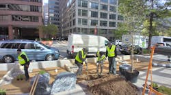 TCG Property Care employees working on the Golden Triangle Project in Washington, D.C., which included 11 new rain gardens and 10 expanded tree boxes. TCG Property Care won a number of successful project bids thanks to their participation in the Clean Water Project&rsquo;s business development programs.