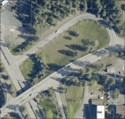 Aerial view of the project area before installation of the swale system. Aerial view of the project area before installation of the swale system.