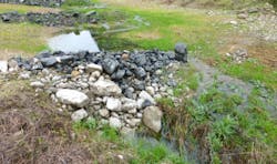 The project employed hundreds of check dams to reduce flow. The project employed hundreds of check dams to reduce flow.