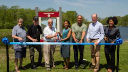 In the photo (L-R): Palos Heights 1st Ward Ald. Donald Bylut, and 2nd Ward Ald. Jack Clifford, Palos Heights Mayor Robert Straz, MWRD President Kari K. Steele, FPCC General Superintendent Arnold Randall, State Senator Bill Cunningham (18th District) and MWRD Commissioner Chakena D. Perry cut the ribbon on the Arrowhead Lake Flood Control Project.
