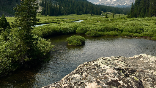 Snow and glacial melt from the Wind River Mountains in Wyoming feeds the Wind River via Dinwoody Creek.