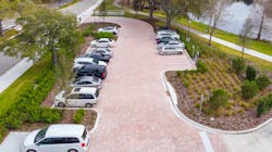 A permeable paver system helped meet both the stormwater storage and water quality requirements within the footprint of the proposed parking areas. A permeable paver system helped meet both the stormwater storage and water quality requirements within the footprint of the proposed parking areas.