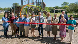 Officials, staff, and village trustees formally unveiled the new Aspen Trails Park.