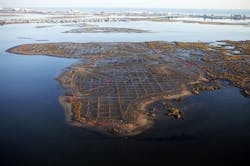 Aerial photo of the Yellow Bar marsh island restoration project in Jamaica Bay, New York. Aerial photo of the Yellow Bar marsh island restoration project in Jamaica Bay, New York.