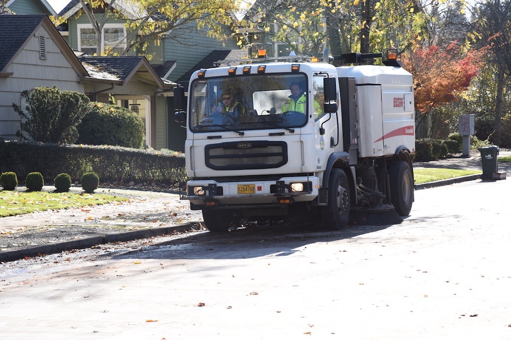 1654812853746 City Of Eugene Oregon Crosswind Sweeper On Residential Street