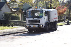 1654812853746 City Of Eugene Oregon Crosswind Sweeper On Residential Street