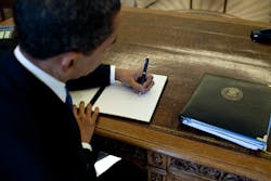 1655260452967 Barack Obama Signs At His Desk 1655260452967 Barack Obama Signs At His Desk