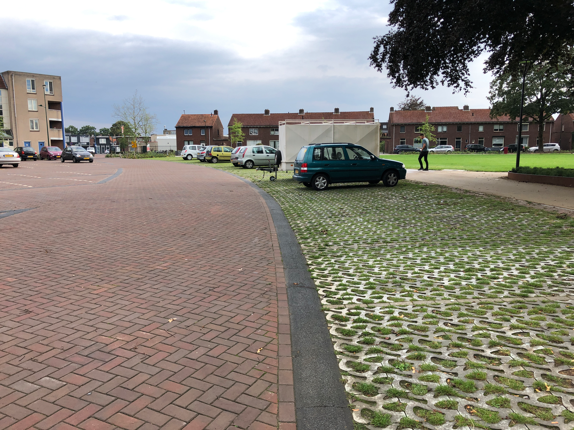 Interlocking brick (left) is one of the oldest forms of permeable paving, while a newer generation of concrete tiles can accommodate gravel or grass.
