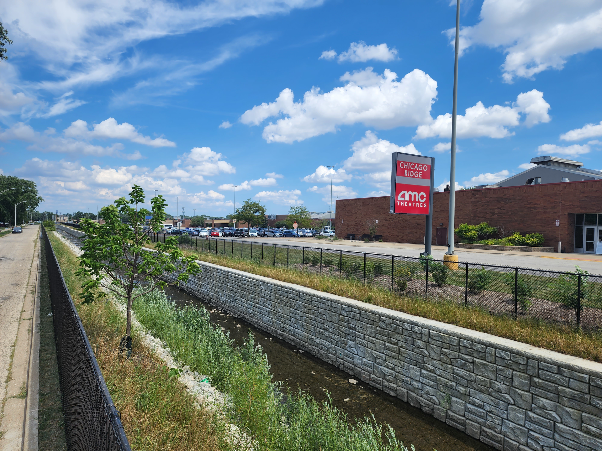 A 12.5 foot-high retaining wall was reinforced on the east streambank of Melvina Ditch.