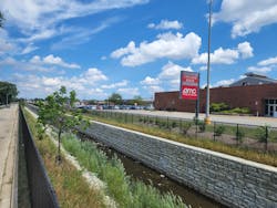 A 12.5 foot-high retaining wall was reinforced on the east streambank of Melvina Ditch. A 12.5 foot-high retaining wall was reinforced on the east streambank of Melvina Ditch.