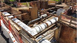 At the intersection of 33rd Avenue and 158th Street, a new 72-inch water main connects to a new 48-inch water main. At the intersection of 33rd Avenue and 158th Street, a new 72-inch water main connects to a new 48-inch water main.