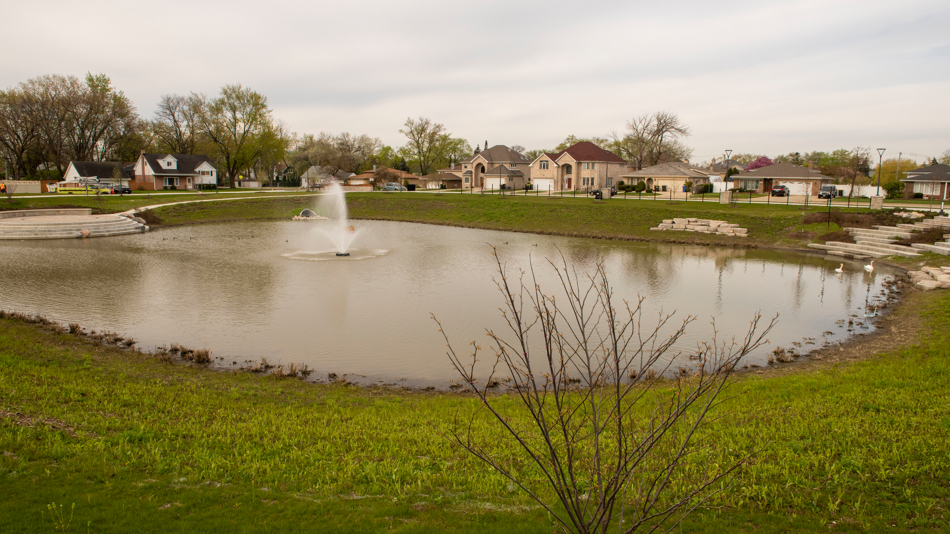 In addition to permeable pavers along Church Street and the park, the project incorporates new landscaping, lighting, an electric vehicle charging station and water feature connected to the stormwater detention facility.