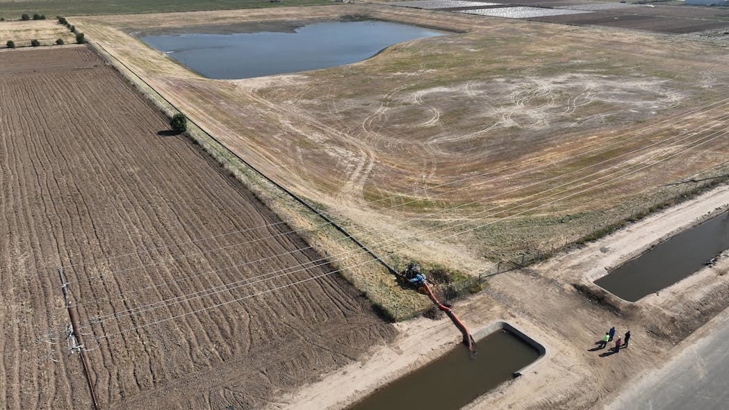 Temporary diversion equipment provided by DWR is deployed by Fresno Irrigation District to divert excess water from Kings River to reduce flood risk and expand groundwater recharge. Photo taken April 27, 2023.