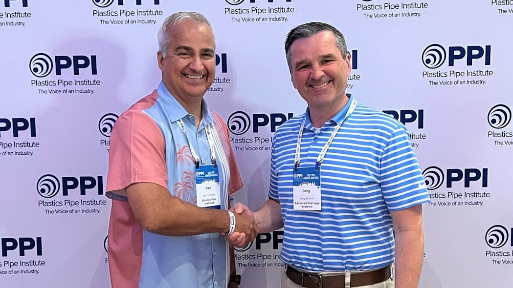 Daniel Currence (left), P.E. director of engineering PPI&rsquo;s Drainage Division congratulates Greg Baryluk (right) of Advanced Drainage Systems for being named Member of the Year for the division.