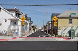 New infrastructure in Gerritsen Beach includes rebuilt roads and sidewalks as well as new sewers, water mains, catch basins and fire hydrants. Construction took nine months less than anticipated and the project cost was $3.5 million below the original budget. New infrastructure in Gerritsen Beach includes rebuilt roads and sidewalks as well as new sewers, water mains, catch basins and fire hydrants. Construction took nine months less than anticipated and the project cost was $3.5 million below the original budget.