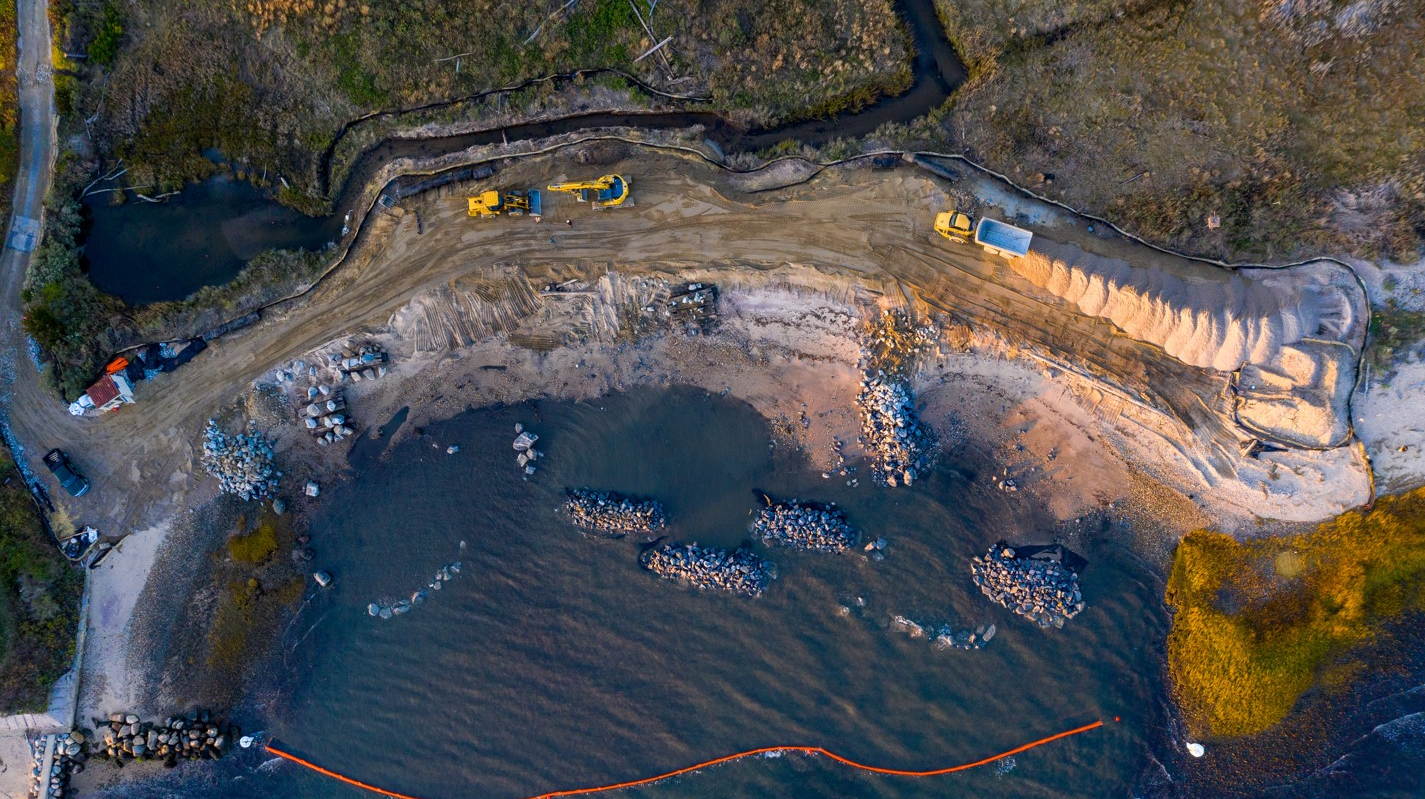 A two-dimensional numerical wave model (SWAN) was used to determine the need for wave attenuation and inform placement of the living shoreline features.