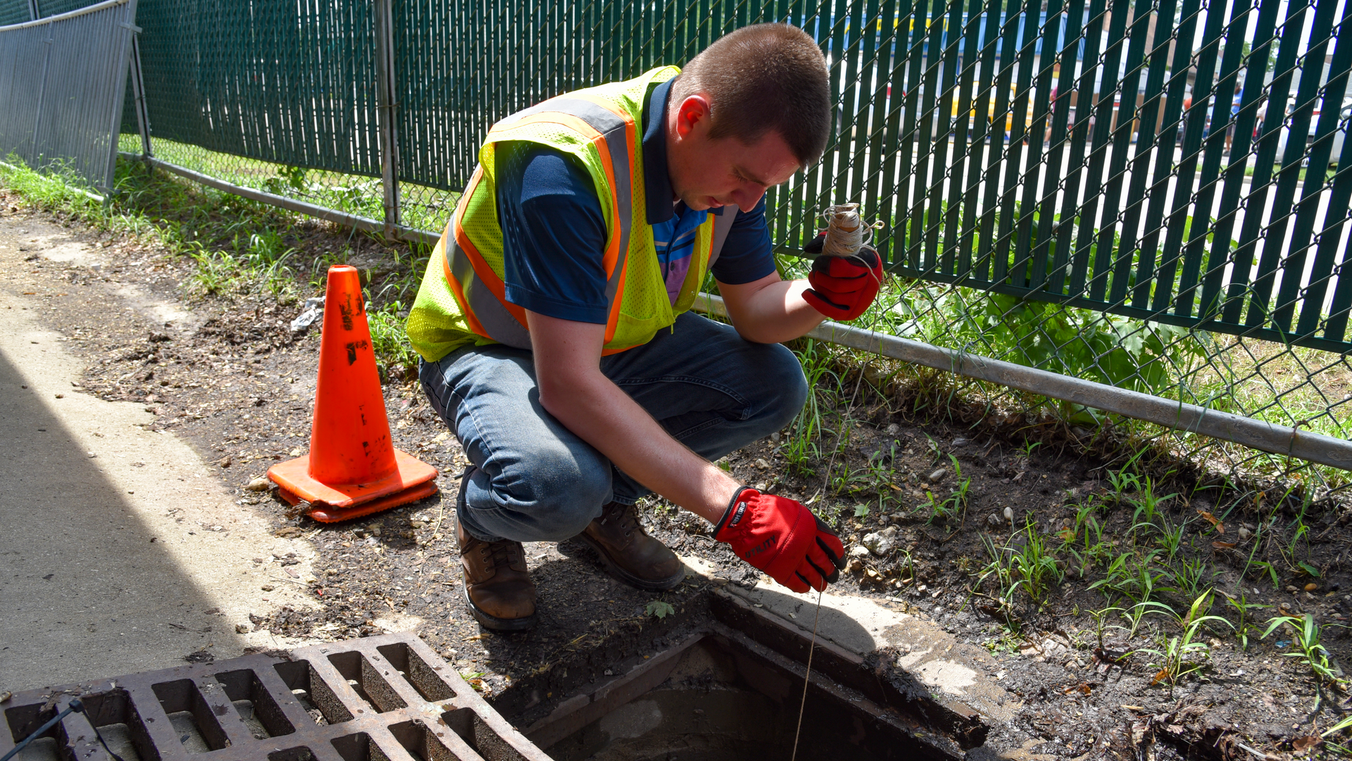 Outfall characteristics may not allow for a grab sample to be easily obtained. To avoid a confined entry, one method is to take a sample from the surface using a string and bottle.