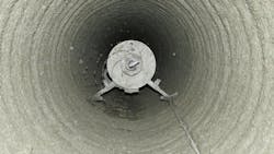 Mayer Specialty Services pulls a spinner spraying Storm Seal using a winch and electric control panel through a CMP in Hays, Kansas. Mayer Specialty Services pulls a spinner spraying Storm Seal using a winch and electric control panel through a CMP in Hays, Kansas.