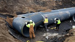 The pipes for this project were wrapped in non-woven geotextile. The pipes for this project were wrapped in non-woven geotextile.