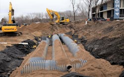 The underground system designed for a 100-year storm is made up of three rows of Prinsco’s 60-inch diameter dual-wall Goldpro Storm polypropylene pipe. The underground system designed for a 100-year storm is made up of three rows of Prinsco’s 60-inch diameter dual-wall Goldpro Storm polypropylene pipe.