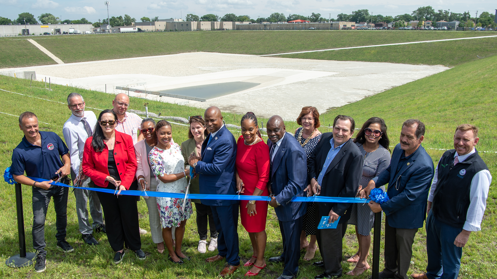 MWRD commissioners, state and federal leaders, project supporters and local mayors formally unveiled the new Addison Creek Reservoir to take on overbank flooding from the connecting Addison Creek Channel.