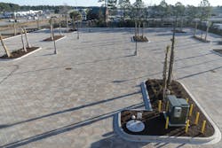 Rock storage beneath the pavers created an underground reservoir for rainwater. Rock storage beneath the pavers created an underground reservoir for rainwater.